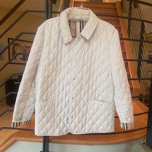Burberry never worn women’s jacket . Perfect condition . Women’s size xl